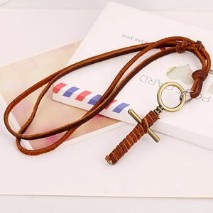 Retro cross necklace with brown top grain leather cord and bronze metal pendant