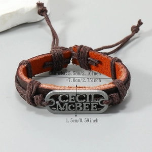 Bracelet vintage en cuir tressé marron avec plaque métallique et taille ajustable