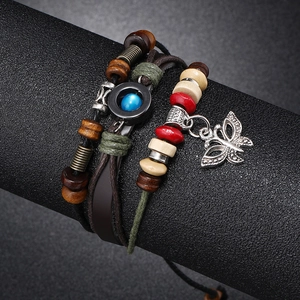 Multilayer leather beaded bracelet set featuring retro butterfly pendant on display