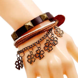 Retro multi-layer leather bracelet with bronze rivets and four-leaf clover charms