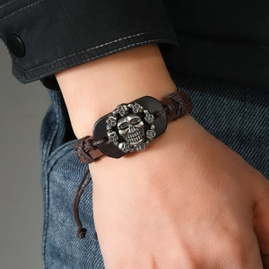 Bracciale punk in pelle intrecciata con teschio in argento vintage da uomo