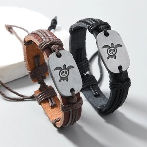 Vintage woven leather bracelet set with sea turtle and peace symbol metal plates