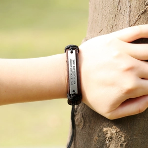 Vintage leather bracelet with engraved metal plate and braided cord for men and women
