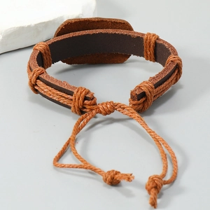 Handmade braided brown leather bracelet with adjustable cord for men and women