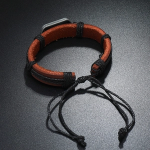 Handmade vintage brown leather bracelet with woven rope and adjustable cord closure