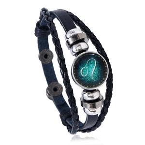 Detail of multi-layer braided leather bracelet with Leo zodiac glass charm and beads