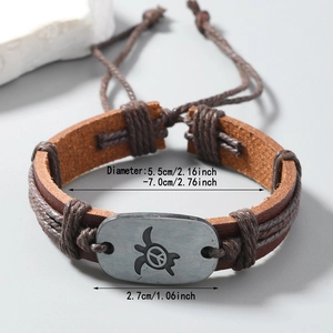 Vintage braided leather bracelet with turtle peace charm and adjustable cord