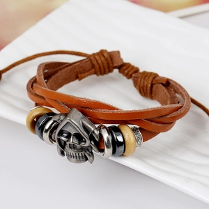 Gothic brown braided leather bracelet with silver skull charm and wooden beads