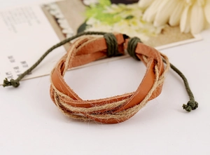 Detailed view of handmade braided leather bracelet with natural hemp rope and twine