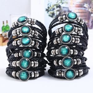 Handmade 12 zodiac leather bracelets set with woven straps and blue sparkling glass gems