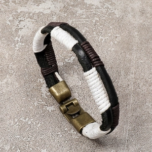 Men's vintage braided leather bracelet with cotton thread accents and antique metal clasp