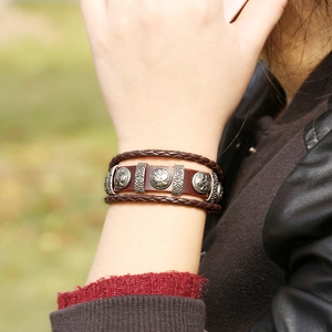 Retro multi-layer braided leather bracelet with embossed metal charms for men and women