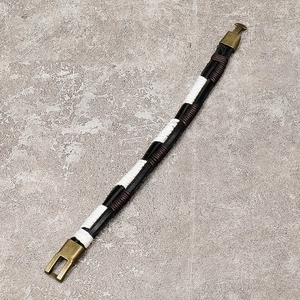 Retro braided leather bracelet for men featuring black, brown cords and brass T-bar clasp