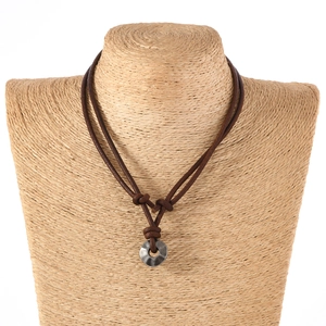 Adjustable vintage leather necklace with a handcrafted textured grey metal ring pendant