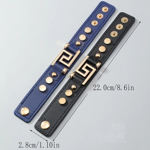 Punk leather bracelets in black and blue with gold geometric pattern and studs