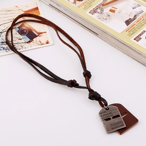 Vintage short brown leather necklace with antique silver alloy tags on white background