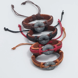 Handcrafted vintage leather woven bracelet set with rustic alloy charms for men