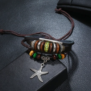 Handmade multilayer leather bracelet with beaded charms and starfish pendant in boho style
