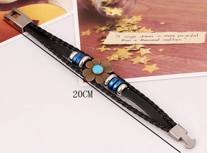 Detail of a 20cm multi-layer braided leather bracelet with vintage bronze flower accents