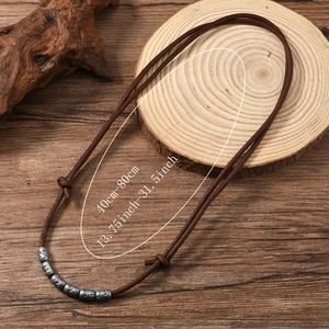 Vintage brown leather cord necklace with adjustable sliding knots and silver metal beads