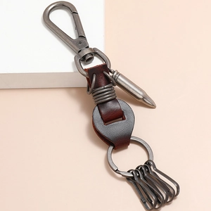 Retro brown leather keychain with vintage silver bullet pendant and multi-key claw ring