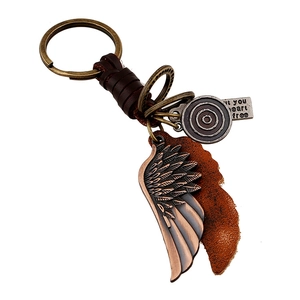 Porte-clés Punk Vintage en Alliage Bronze Aile de Plume en Cuir Véritable pour Hommes Femmes Porte-clés Rétro Tissé à la Main Bijoux Cadeau