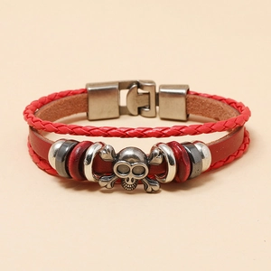 Multilayer red leather bracelet with silver skull charm and metallic beaded accents