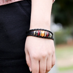Retro multi-layer braided leather bracelet with vintage beads and amber resin accent