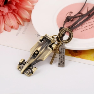 Vintage punk necklace with brass F1 racing car pendant and cross on adjustable leather cord