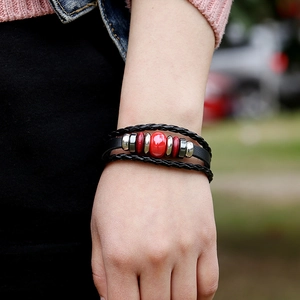Punk style multi-layer cowhide leather bracelet with red ceramic beads and metallic accents