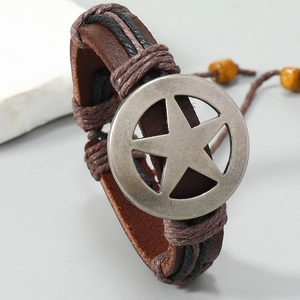 Handmade vintage brown leather woven bracelet featuring a matte silver pentagram star pendant
