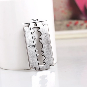 Detailed view of 45x25mm blade pendant in antique silver alloy for DIY necklaces