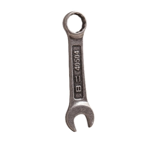 Vintage silver wrench pendant with rustic finish and embossed numbering detail