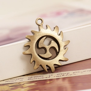 Bronze sun gear pendant with mitsu tomoe cutout for DIY jewelry and necklaces