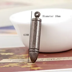 Detail showing 62mm long vintage silver bullet pendant with 10mm diameter and ring loop