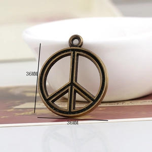 Detail view of a 36mm bronze peace sign pendant with dimensions shown on white background