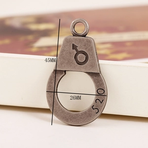 Macro detail of handcuff pendant with 520 engraving for DIY jewelry making