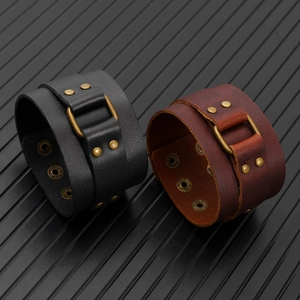 Punk vintage wide leather bracelets in black and brown with bronze buckles and metal rivets