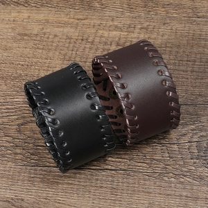 Vintage braided leather bracelets in black and brown with punk rock style weaving decoration