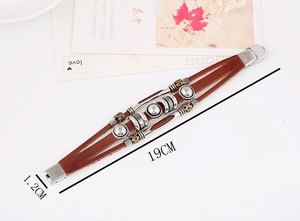 Detail view of multi-layer leather bracelet with vintage beads and 19cm length specs