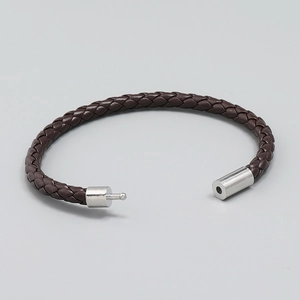 Bracciale minimalista in pelle intrecciata marrone scuro con chiusura industriale argento