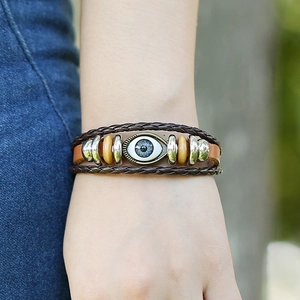 Bohemian multi-layer leather braid bracelet with blue evil eye charm and wooden beads