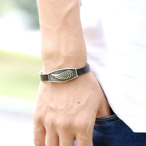 Men's punk style leather bracelet with vintage gold wing metal plate on wrist