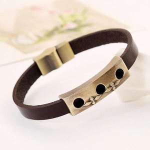Vintage brown leather bracelet with bronze cross relief and retro punk style charms