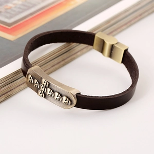 Punk vintage dark brown leather bracelet with gold skull plate and magnetic clasp