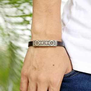 Retro brown leather bracelet with metal plate featuring male and female gender symbols