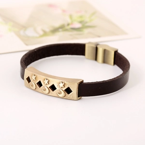 Vintage dark brown leather bracelet with antique bronze star and moon metal charms
