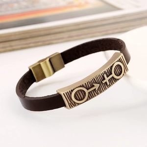Vintage leather couple bracelet with bronze metal charm featuring gender symbols