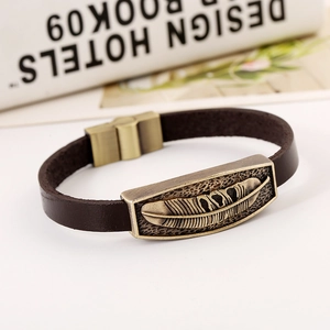 Retro dark brown leather bracelet featuring a vintage bronze feather plate and magnetic clasp