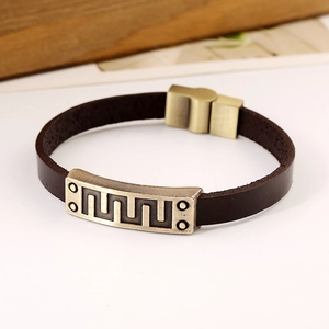 Retro dark brown leather bracelet with geometric engraved bronze plate and magnetic clasp